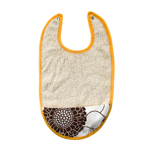 Ekologisk haklapp för barn med uppsamlingsficka i brunblommigt retrotyg